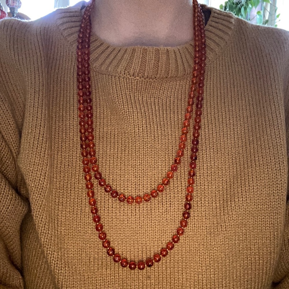 Amber colored necklace. Vintage clasp.